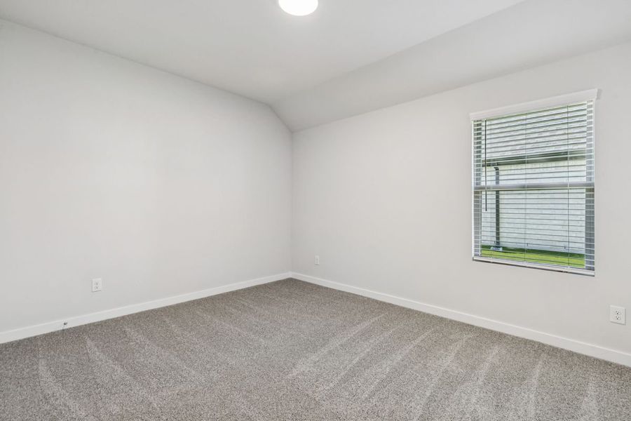 Bedroom in the Oscar home plan by Trophy Signature Homes – REPRESENTATIVE PHOTO Bedroom in the Oscar home plan by Trophy Signature Homes – REPRESENTATIVE PHOTO