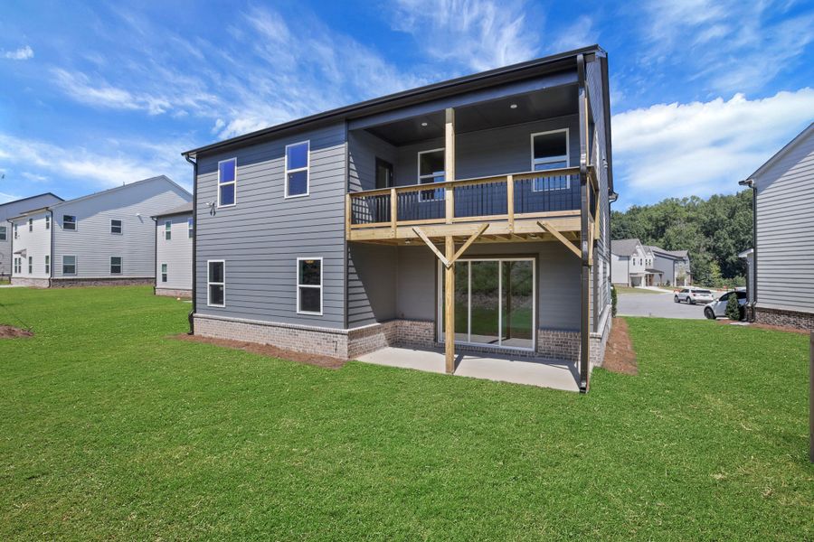 Exterior details and patio area of a home in The Paddocks at Doc Hughes, Buford (Image 3). Exterior details and patio area of a home in The Paddocks at Doc Hughes, Buford (Image 3).
