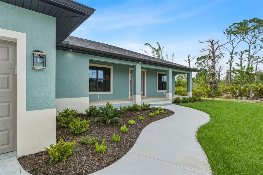 Exterior details and patio area of a home in , Port Charlotte (Image 4).