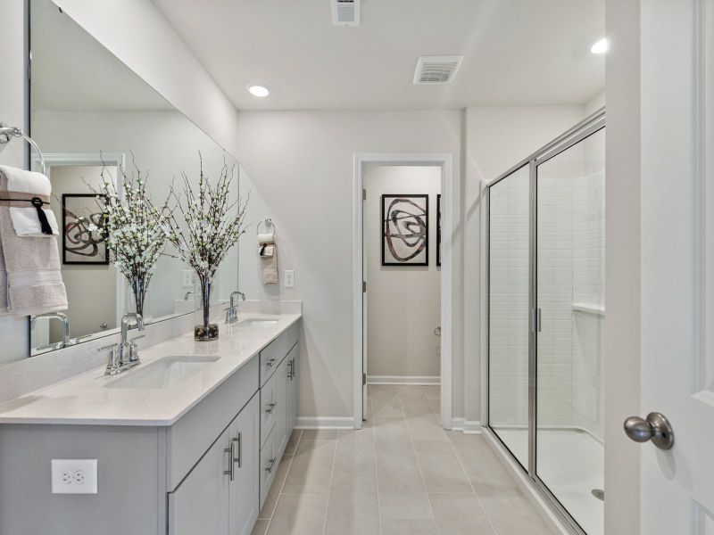 Furnished interior view inside a new home in Waterside - Coastline Series, Longs (Image 11). Furnished interior view inside a new home in Waterside - Coastline Series, Longs (Image 11).