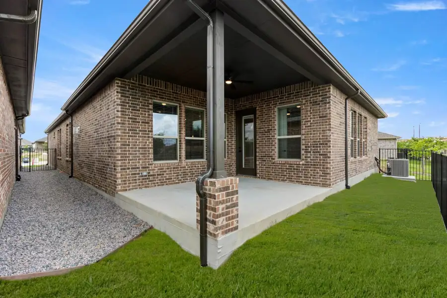 Exterior details and patio area of a home in Ladera at Tavolo Park, Fort Worth (Image 4).