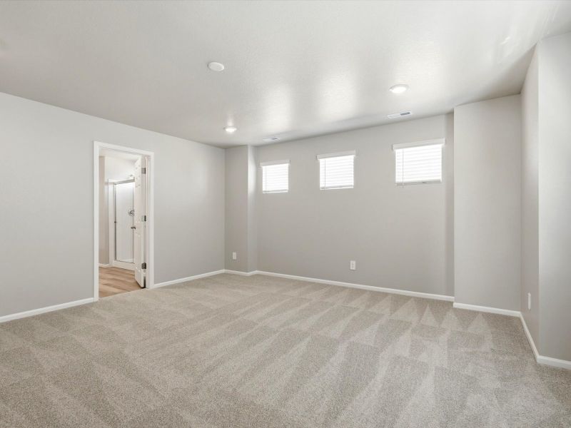 Spacious, unfurnished interior of a new home in Buffalo Highlands: The Flora Collection, Commerce City (Image 11).