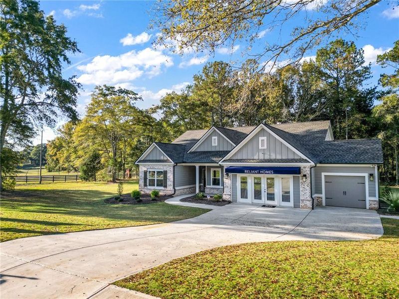 Front exterior of a new home in Belle Woode Estates, Monroe, GA, highlighting curb appeal (Image 1). Front exterior of a new home in Belle Woode Estates, Monroe, GA, highlighting curb appeal (Image 1).