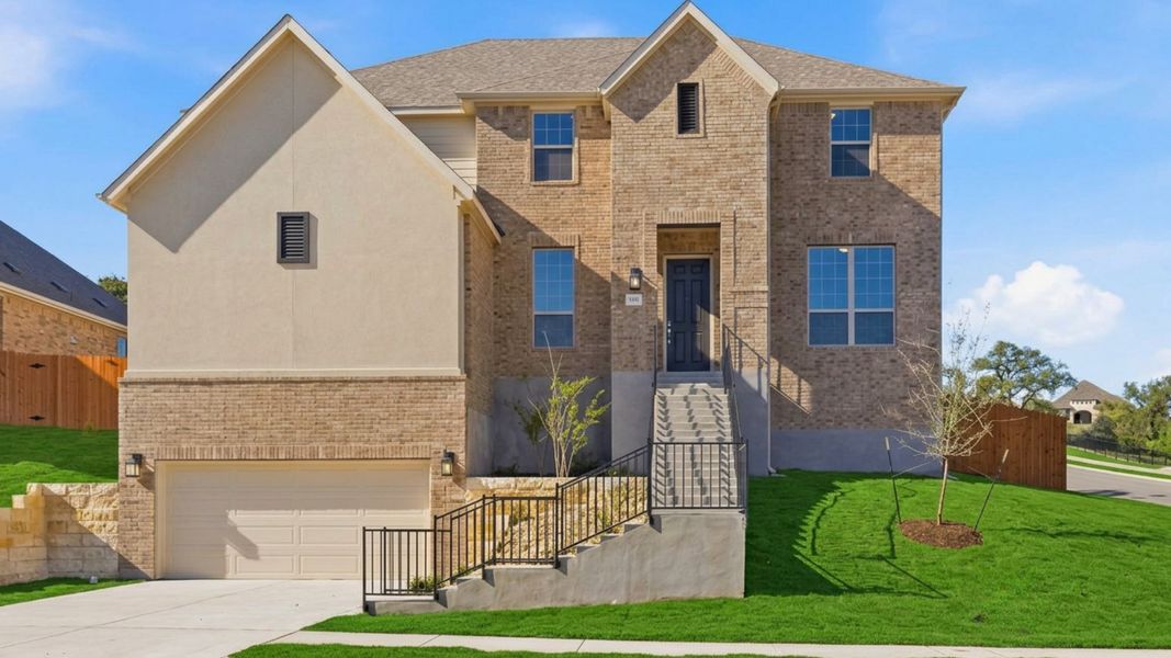 Representative exterior photo of a completed home built from the Brown by DRB Homes in Retreat at San Gabriel, Georgetown, TX (Image 21).
