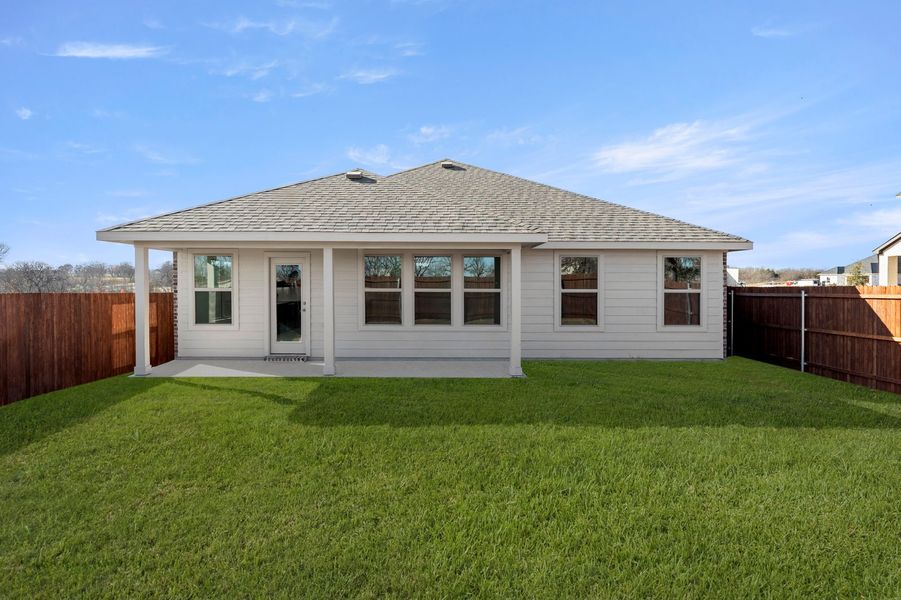 Front exterior of a new home in Belmont, Aubrey, TX, highlighting curb appeal (Image 26). Front exterior of a new home in Belmont, Aubrey, TX, highlighting curb appeal (Image 26).