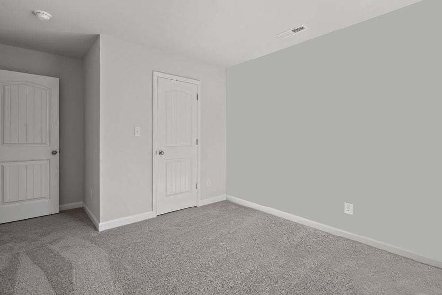 Representative unfurnished interior of a home built from the Camellia by Caviness & Cates Communities in Bartlett Manor, Youngsville (Image 59).