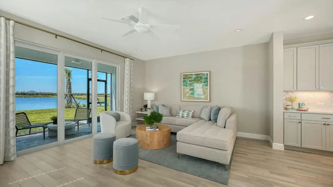 Furnished interior view inside a new home in SkySail Real Estate and Homes for Sale in Naples, FL - Neal Communities, Naples (Image 6).