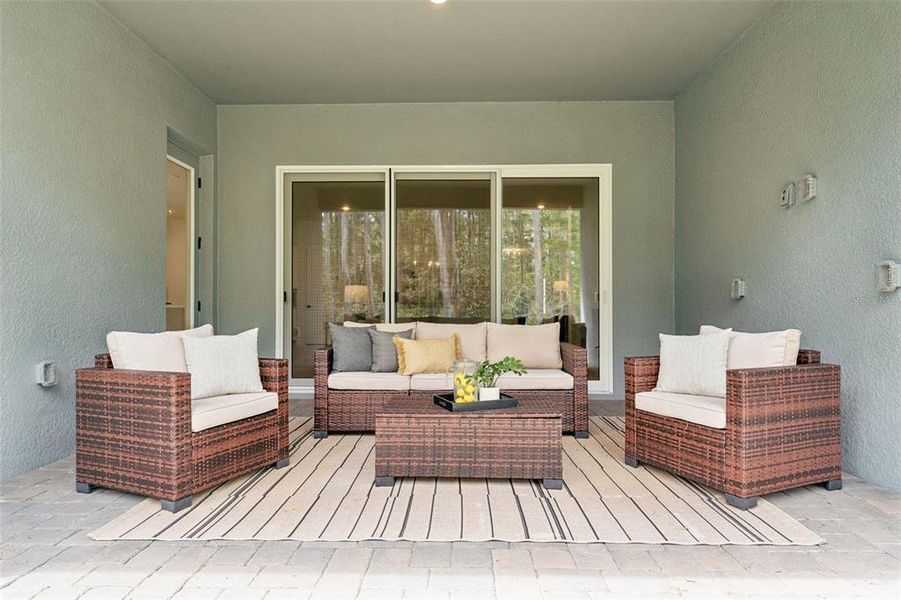 Exterior details and patio area of a home in Palms at Windermere, Windermere (Image 33).