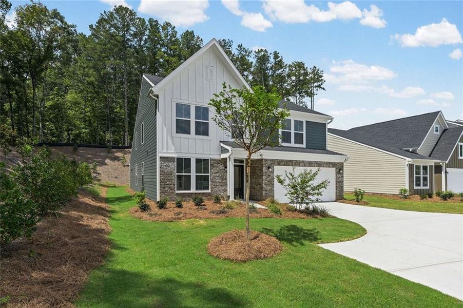 Front exterior of a new home in Easton Park, Dallas, GA, highlighting curb appeal (Image 24). Front exterior of a new home in Easton Park, Dallas, GA, highlighting curb appeal (Image 24).