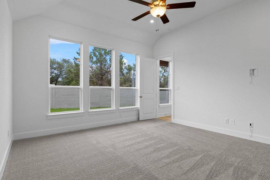 Primary Bedroom with elevated ceiling