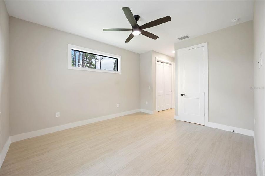 Spacious, unfurnished interior of a new home in , Port Charlotte (Image 15).
