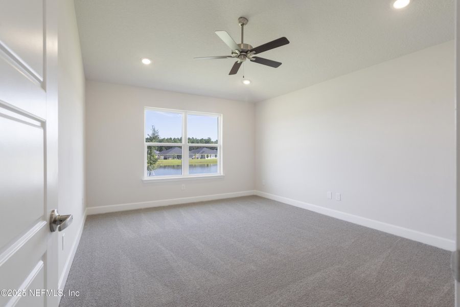Spacious, unfurnished interior of a new home in Shadow Crest at Rolling Hills, Green Cove Springs (Image 11).