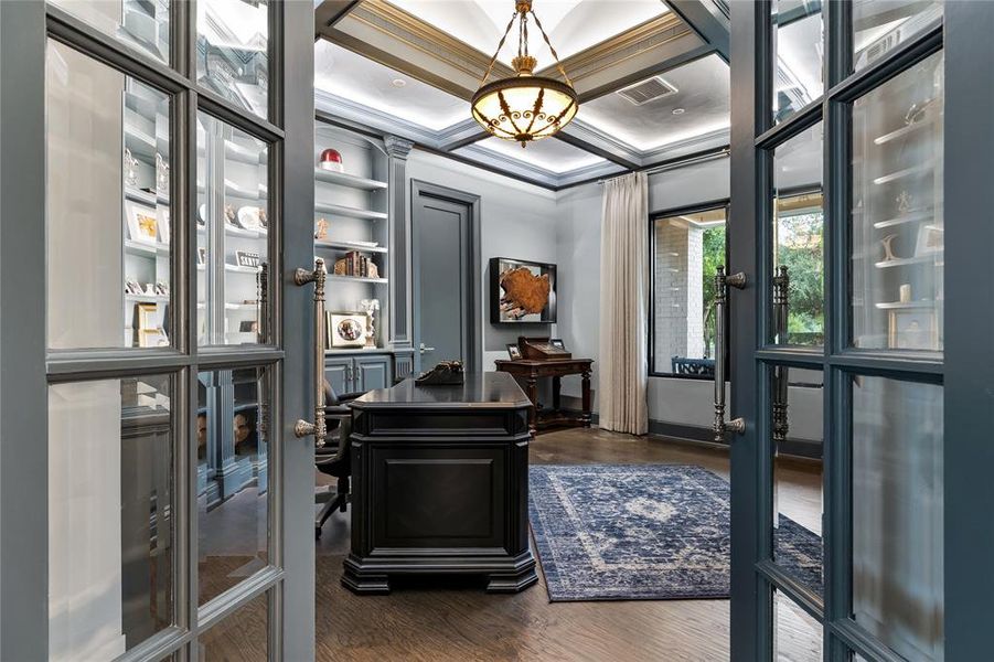 Office space featuring crown molding, french doors, and dark hardwood / wood-style floors