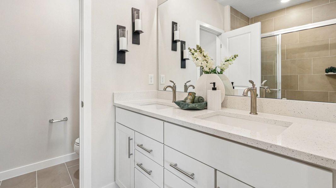 Flagler Floor Plan Primary Suite Bathroom with Dual Sink Vanity and Quartz Countertops Flagler Floor Plan Primary Suite Bathroom with Dual Sink Vanity and Quartz Countertops