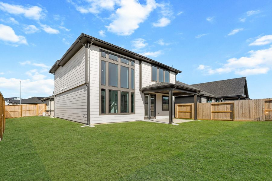 Exterior details and patio area of a home in Jubilee 45', 70', Hockley (Image 13).