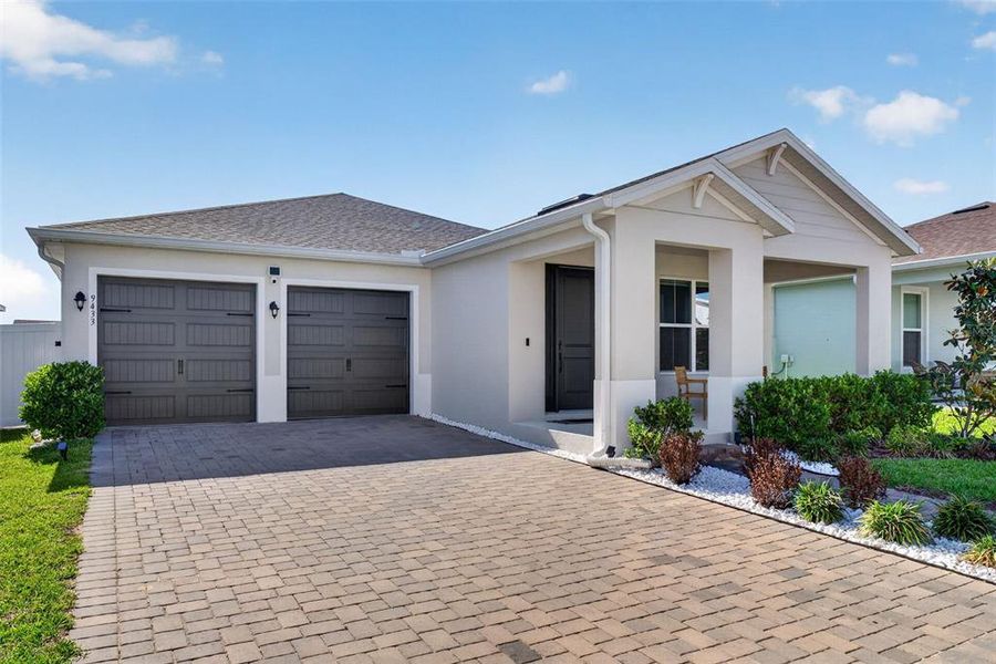 Front exterior of a new home in , Winter Garden, FL, highlighting curb appeal (Image 30).