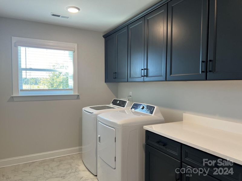 Laundry Room with Upper and Lower Cabinets