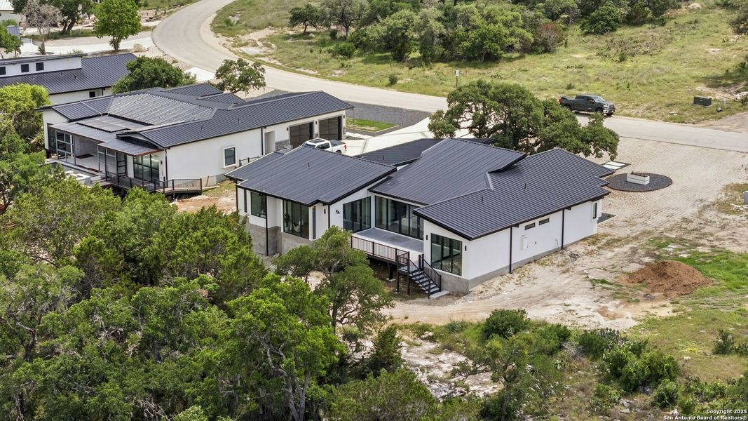 Front exterior of a new home in , Spring Branch, TX, highlighting curb appeal (Image 27).