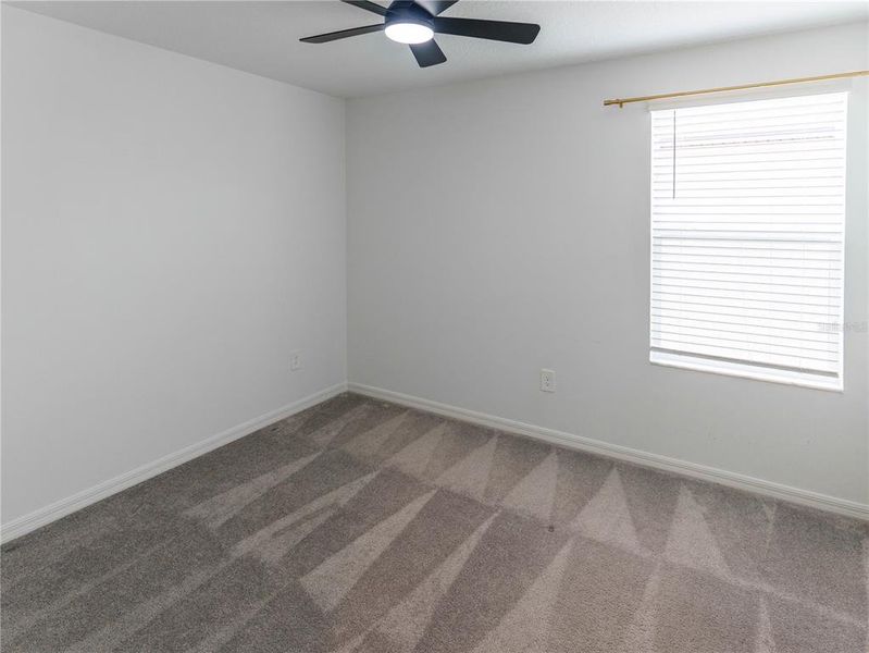 Spacious, unfurnished interior of a new home in The Isle of Avalon, Spring Hill (Image 28).