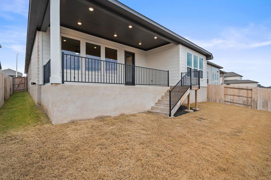 Front exterior of a new home in Park Collection at Lariat, Liberty Hill, TX, highlighting curb appeal (Image 1). Front exterior of a new home in Park Collection at Lariat, Liberty Hill, TX, highlighting curb appeal (Image 1).