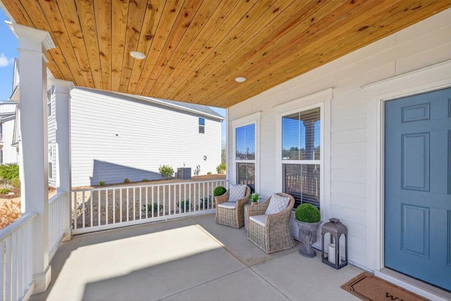 Exterior details and patio area of a home in Reunion, Flowery Branch (Image 33).