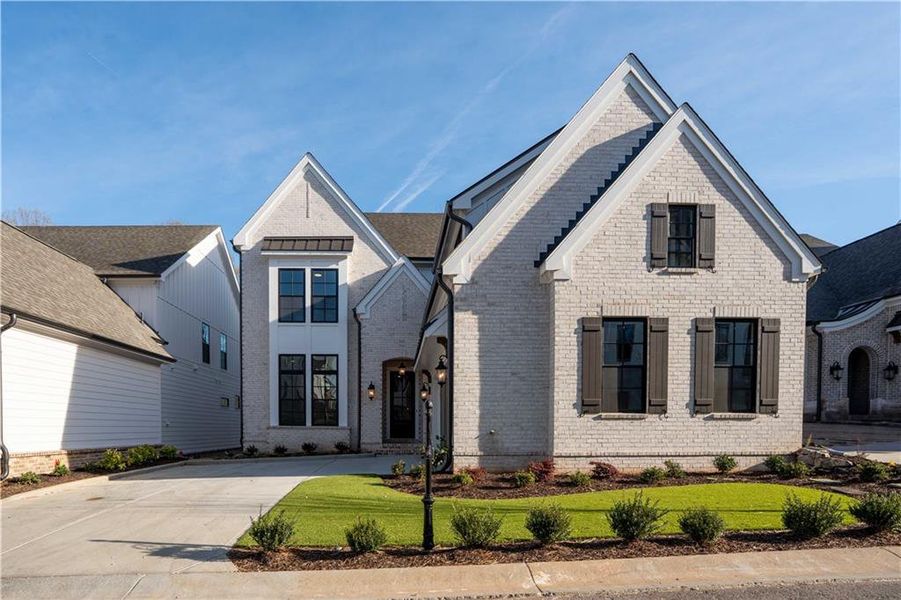Front exterior of a new home in , Peachtree Corners, GA, highlighting curb appeal (Image 2). Front exterior of a new home in , Peachtree Corners, GA, highlighting curb appeal (Image 2).