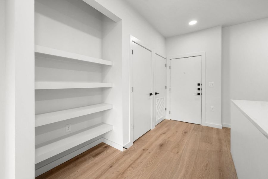 Furnished interior view inside a new home in One Oak, Austin (Image 7).