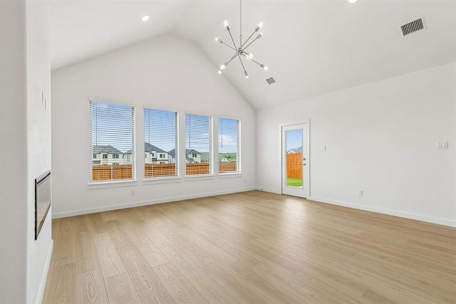 Living Room in the Claret home plan by Trophy Signature Homes – REPRESENTATIVE PHOTO