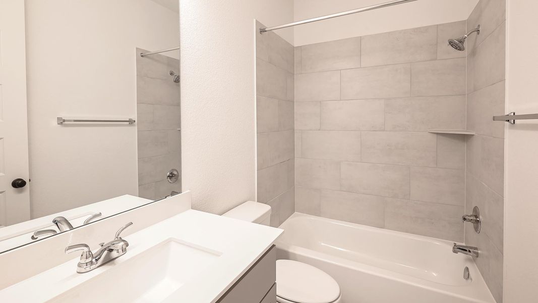 Full bathroom with washtub / shower combination and vanity Full bathroom with washtub / shower combination and vanity