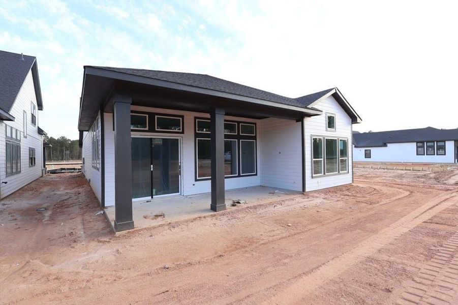 Exterior details and patio area of a home in Two Step Farm - Enclave Collection, Montgomery (Image 2).
