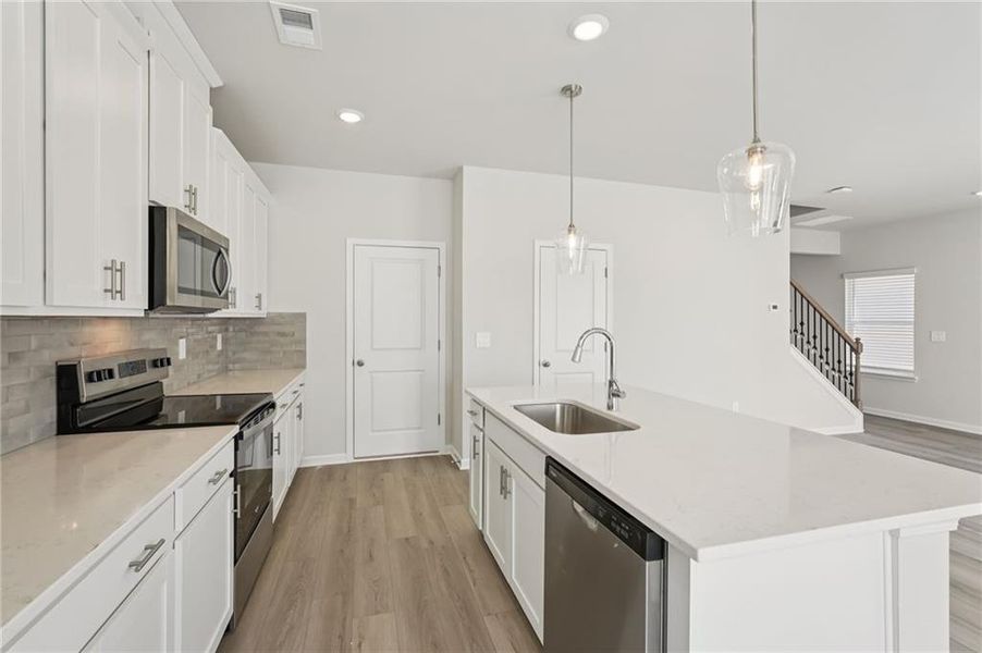 Furnished interior view inside a new home in Hawthorne Station, College Park (Image 9).