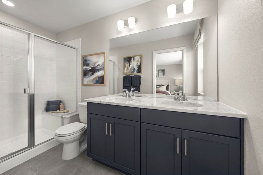 Dual-sink vanity at primary bath