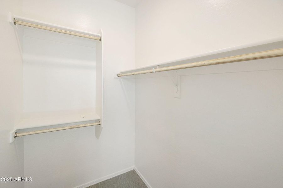 HALL BEDROOM WALK IN CLOSET.