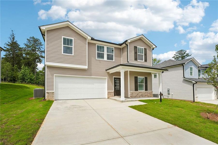 Front exterior of a new home in Manning Mill, Adairsville, GA, highlighting curb appeal (Image 24). Front exterior of a new home in Manning Mill, Adairsville, GA, highlighting curb appeal (Image 24).