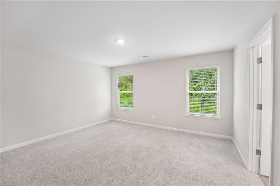 Spacious, unfurnished interior of a new home in Hemingway - Reserve Series, Cumming (Image 48). Spacious, unfurnished interior of a new home in Hemingway - Reserve Series, Cumming (Image 48).