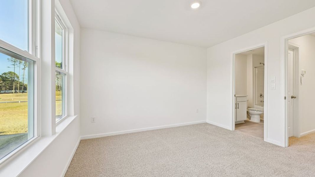 Spacious, unfurnished interior of a new home in Chapel Townes, Raleigh (Image 20).