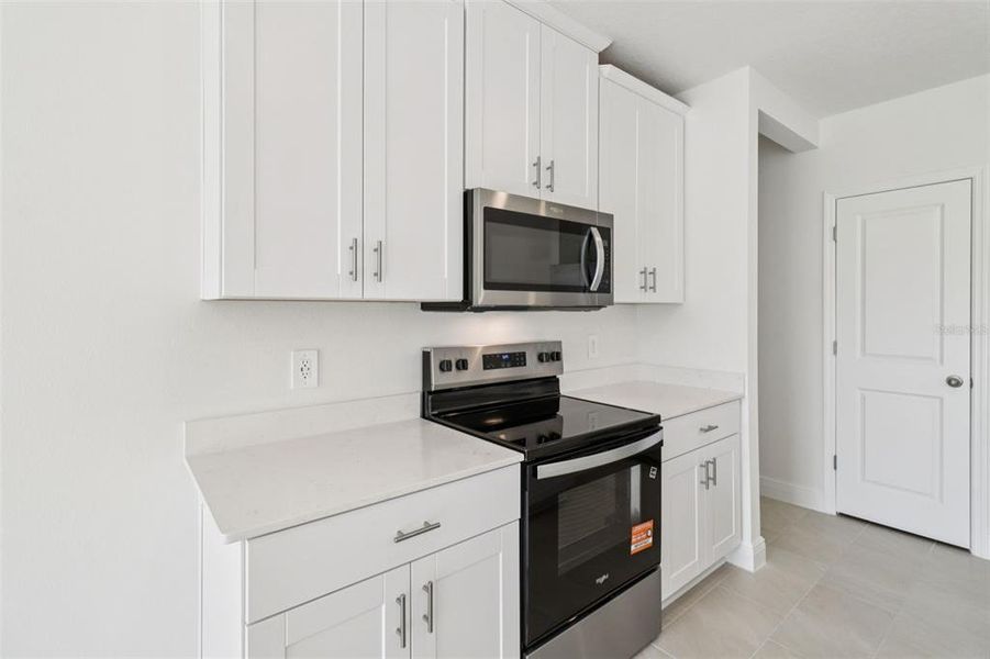 Furnished interior view inside a new home in The Reserve at Hammock Oaks - Classic Series, Lady Lake (Image 8). Furnished interior view inside a new home in The Reserve at Hammock Oaks - Classic Series, Lady Lake (Image 8).