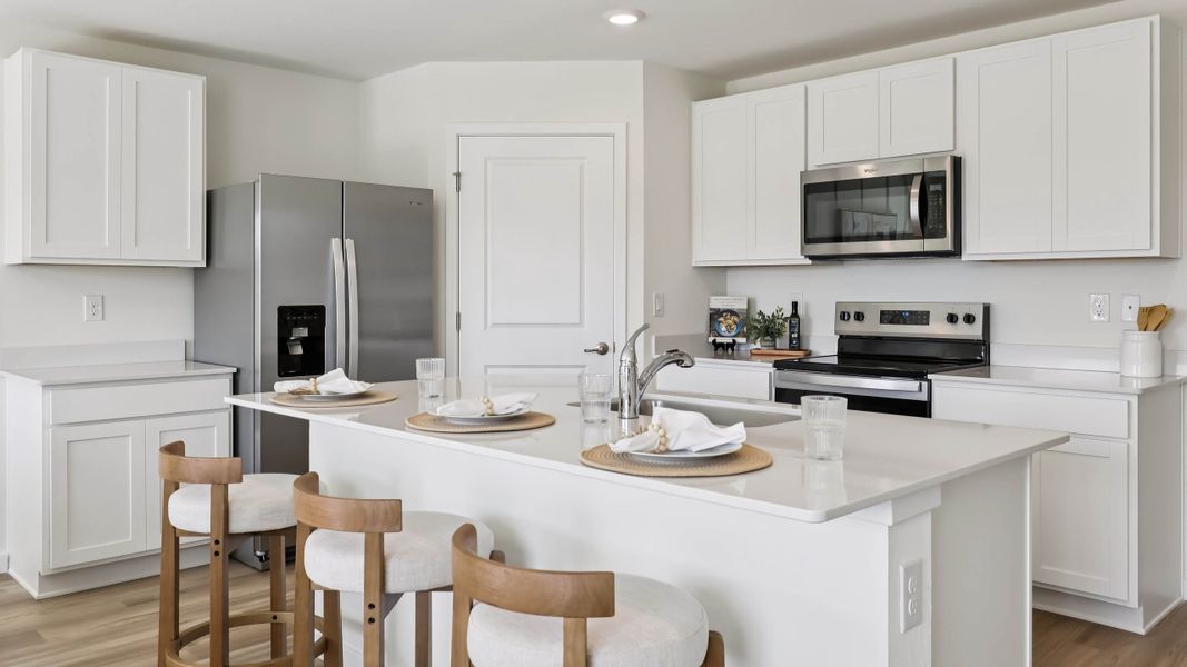 Representative furnished interior of a home built from the Freeport II by D.R. Horton in Somerset Bay, Spring Hill (Image 10). Representative furnished interior of a home built from the Freeport II by D.R. Horton in Somerset Bay, Spring Hill (Image 10).