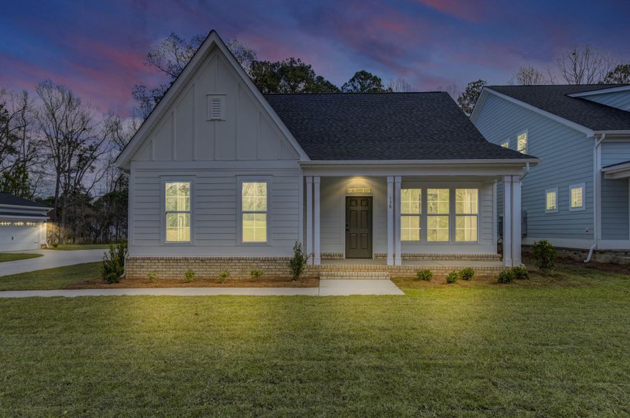 Front exterior of a new home in Clubside Reserve at Summerlake, Lexington, SC, highlighting curb appeal (Image 28). Front exterior of a new home in Clubside Reserve at Summerlake, Lexington, SC, highlighting curb appeal (Image 28).
