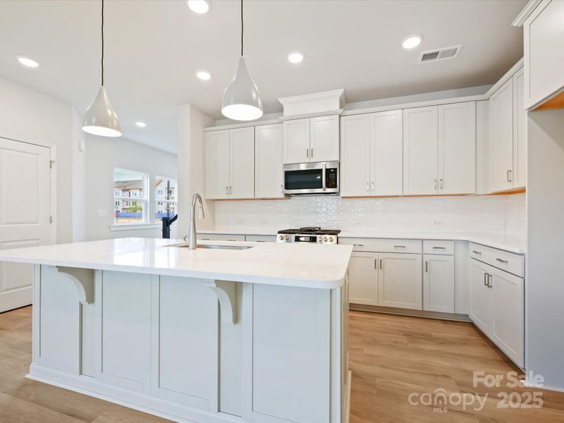 Furnished interior view inside a new home in North Creek Village - Townhomes, Huntersville (Image 9). Furnished interior view inside a new home in North Creek Village - Townhomes, Huntersville (Image 9).
