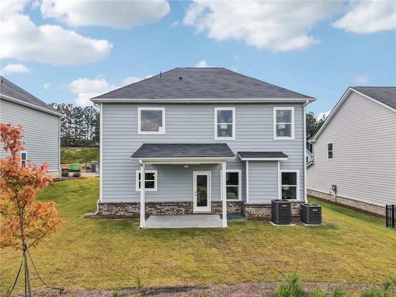 Exterior details and patio area of a home in The Hills at Cedar Creek, Winder (Image 3).