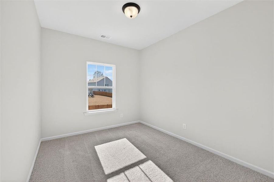 Spacious, unfurnished interior of a new home in Garrett Preserve, Douglasville (Image 28).