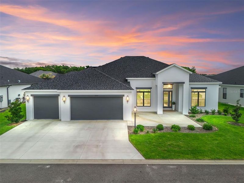 Front exterior of a new home in , The Villages, FL, highlighting curb appeal (Image 1). Front exterior of a new home in , The Villages, FL, highlighting curb appeal (Image 1).