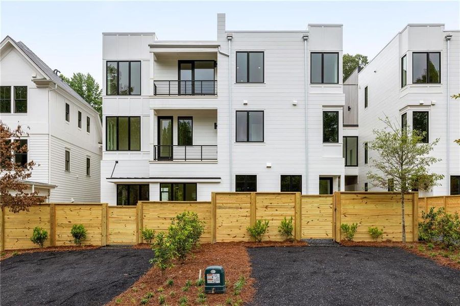 Front exterior of a new home in , Chattahoochee Hills, GA, highlighting curb appeal (Image 1).