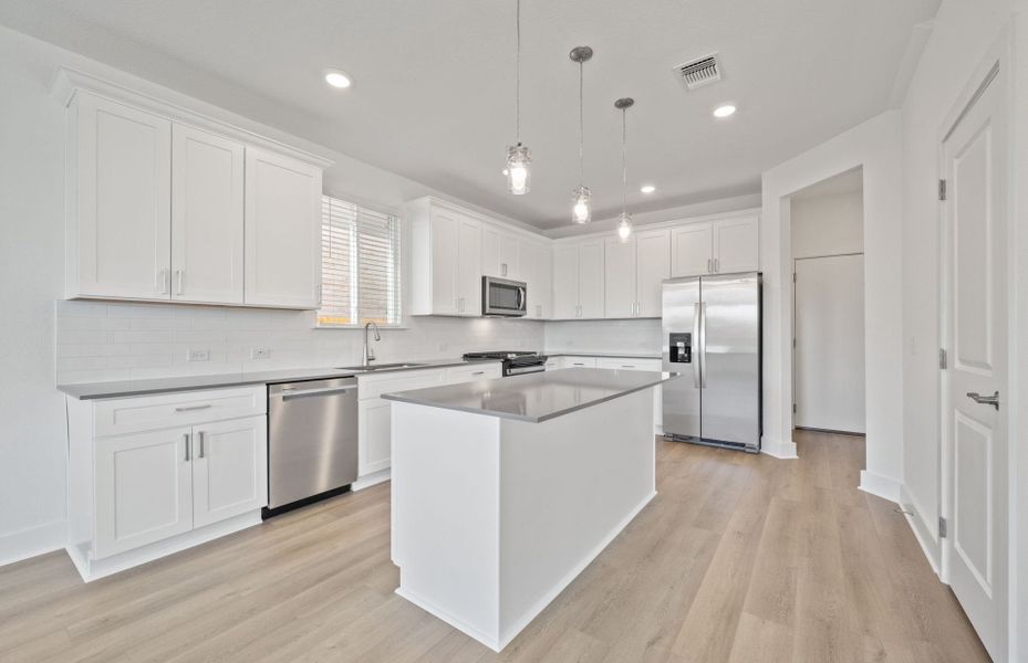 Furnished interior view inside a new home in Crosswinds, Kyle (Image 5).