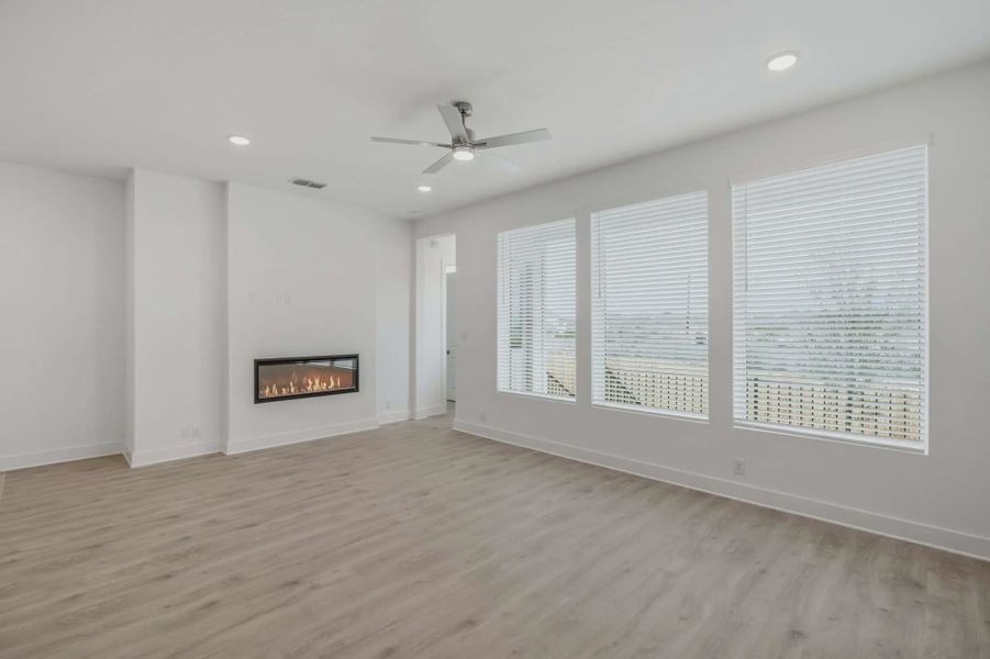 Representative unfurnished interior of a home built from the Talos by Chesmar Homes in Prominence Urban, San Antonio (Image 11).
