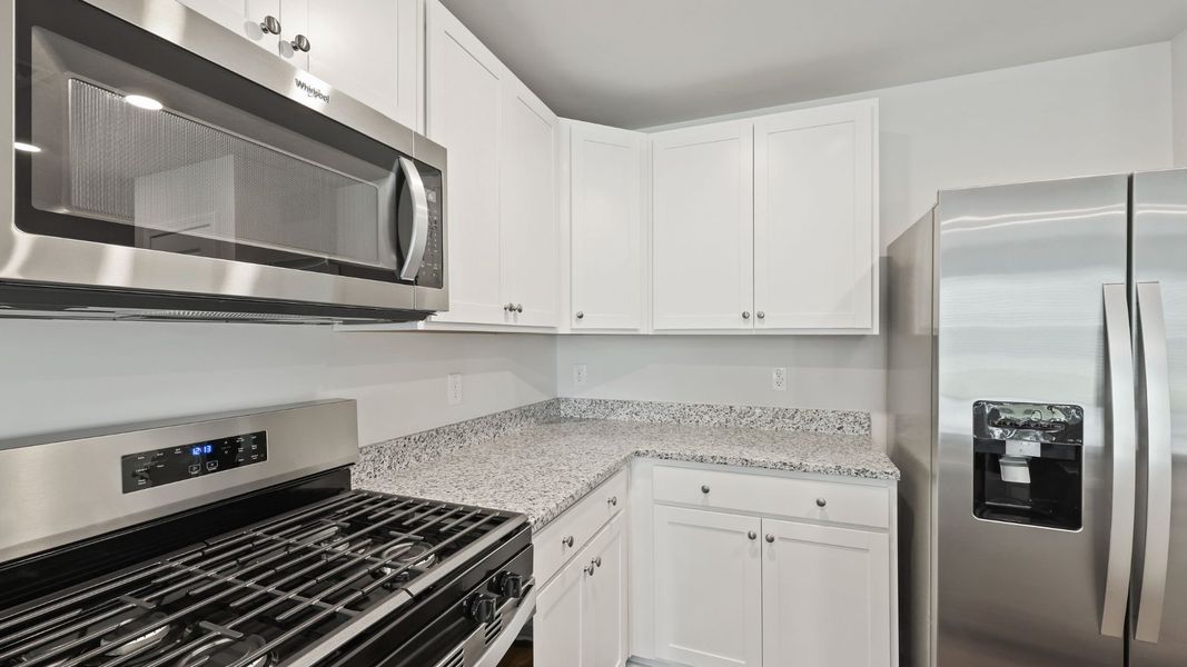 Furnished interior view inside a new home in Pine Hills Townhomes at Cane Bay, Summerville (Image 6).