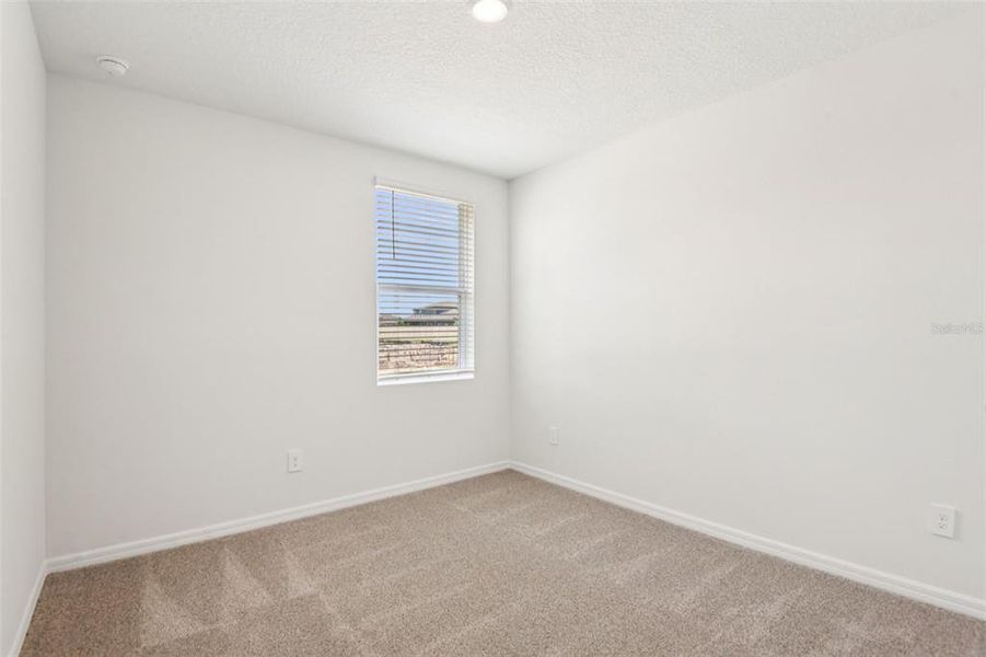 Spacious, unfurnished interior of a new home in Two Rivers - Classic Series, Zephyrhills (Image 19).