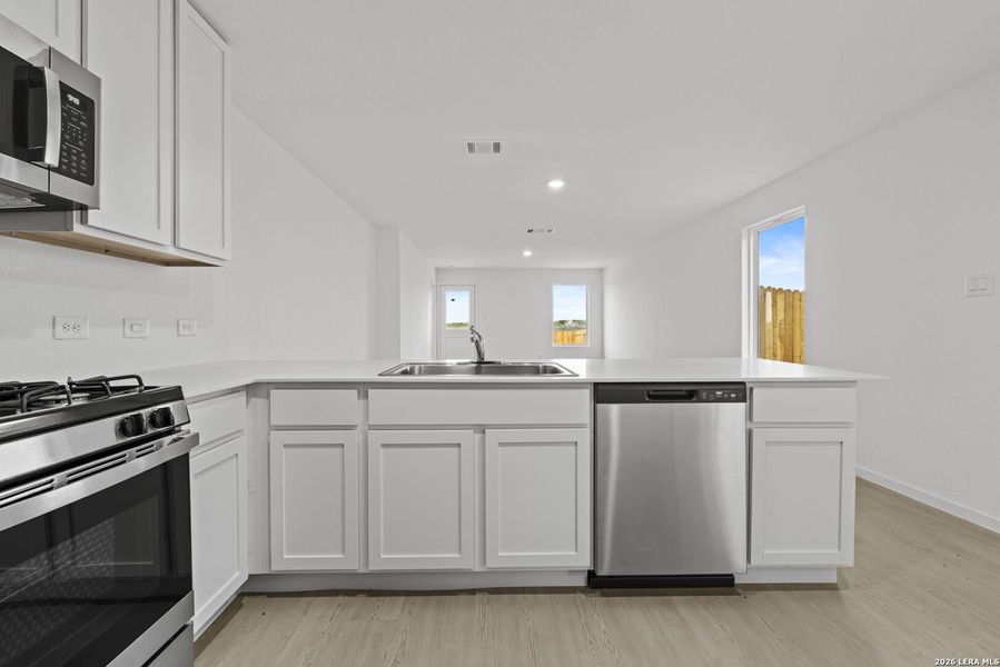 Furnished interior view inside a new home in Spring Grove, St. Hedwig (Image 5).
