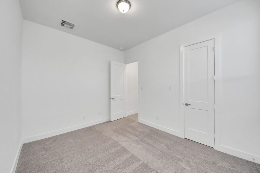 Spacious, unfurnished interior of a new home in Meridiana, Manvel (Image 24).